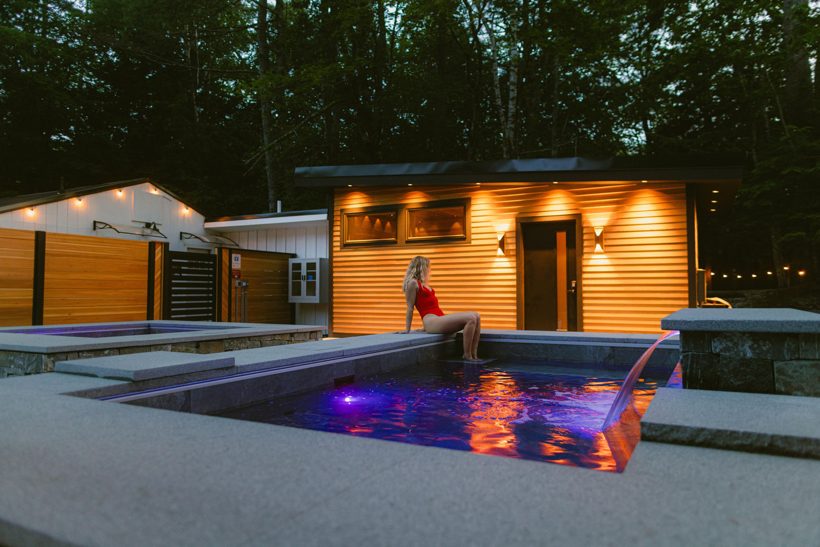 Unwind Nordic Spa at dusk under the pines